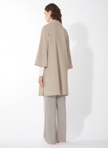 Assymetrical blush pink overcoat in comfort wool
