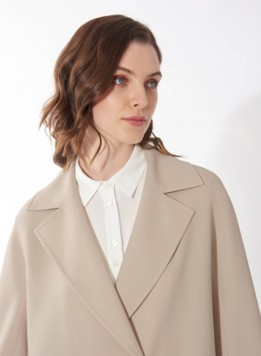 Assymetrical blush pink overcoat in comfort wool