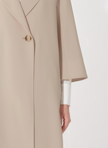 Assymetrical blush pink overcoat in comfort wool