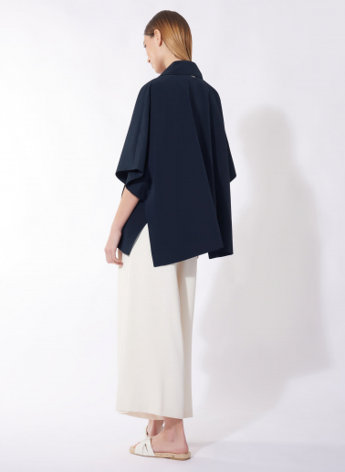 Double breasted blue cape in rainproof technical fabric