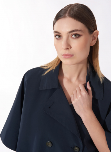 Double breasted blue cape in rainproof technical fabric
