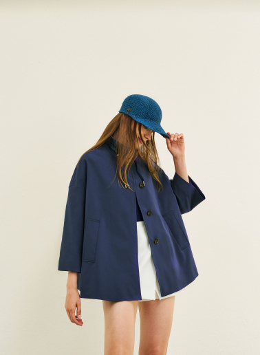Flared marine blue jacket in rainproof technical fabric