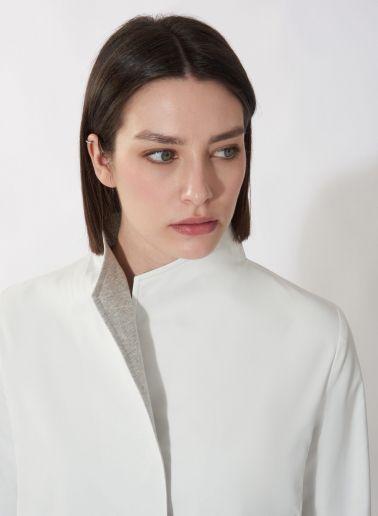 White jacket in rainproof technical fabric with jersey details