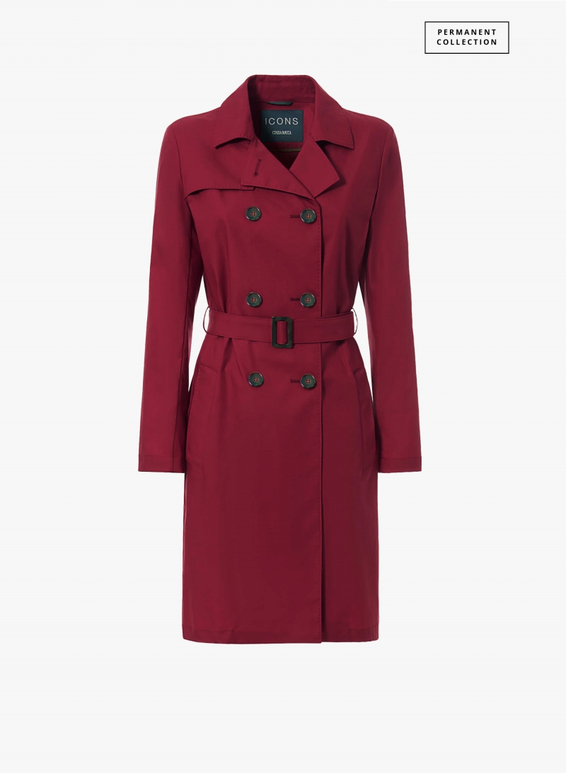Double-breasted red trench coat in technical fabric with tailored stitches