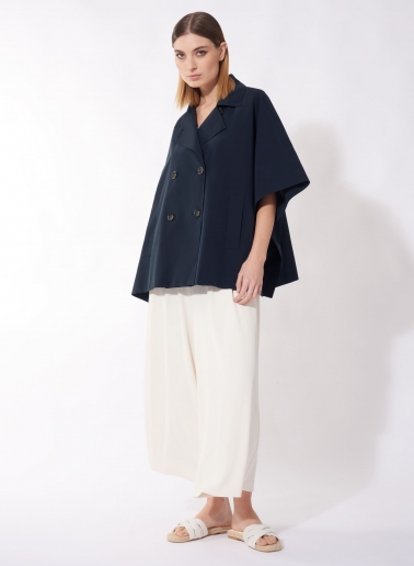 Double breasted beige cape in rainproof technical fabric