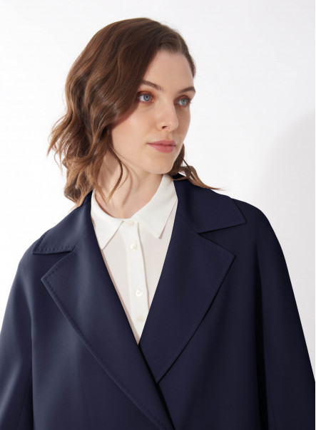 Assymetrical blue overcoat in comfort wool