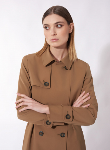 Double breasted tobacco color trench coat in technical fabric