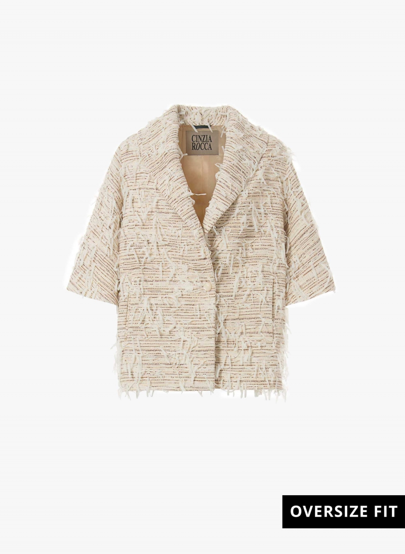 Mantella oversize beige con frange