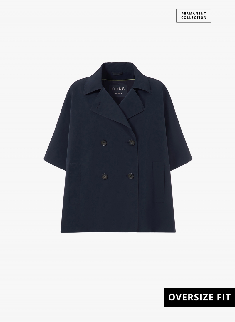 Double breasted beige cape in rainproof technical fabric